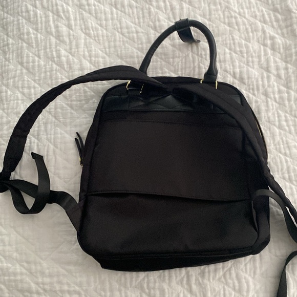 Black backpack with multiple pockets, luggage handle sleeve - Picture 2 of 4